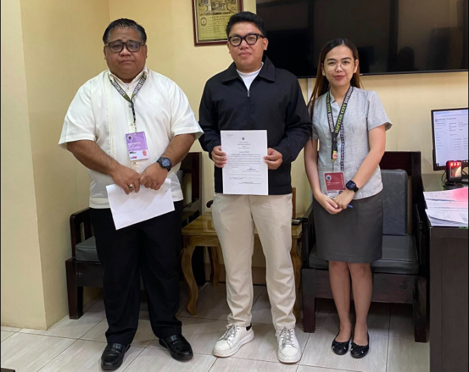 A proud moment captured during the oath-taking ceremony of our newly hired Teacher I